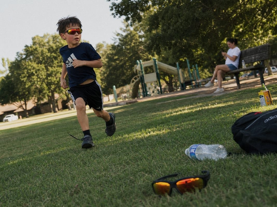 Daily Wear Impact Active daily wear and play accelerating wear and tear on children's sunglasses (ID#3)