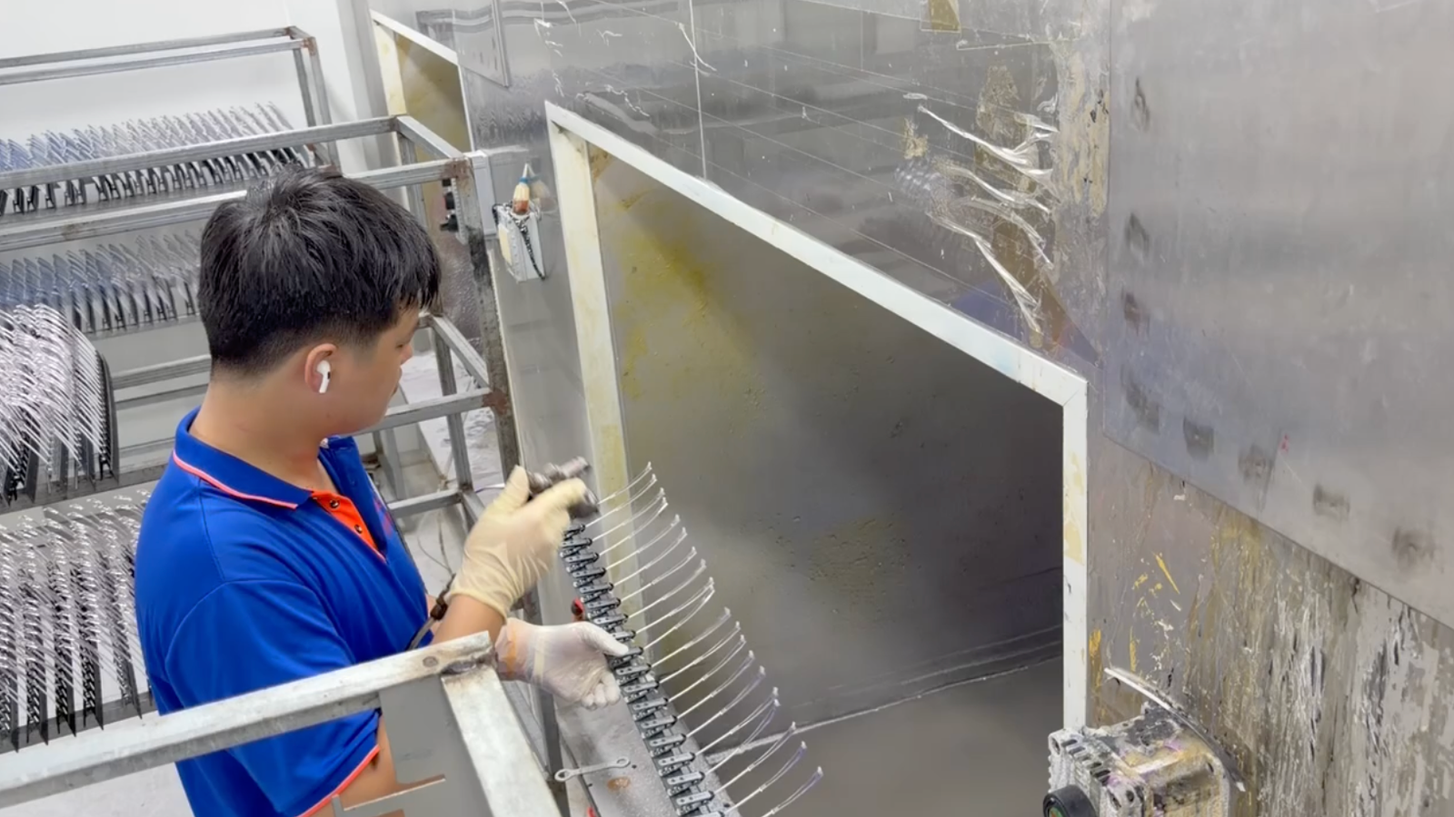 Spray painting color coating onto TR90 and TPEE frame surfaces