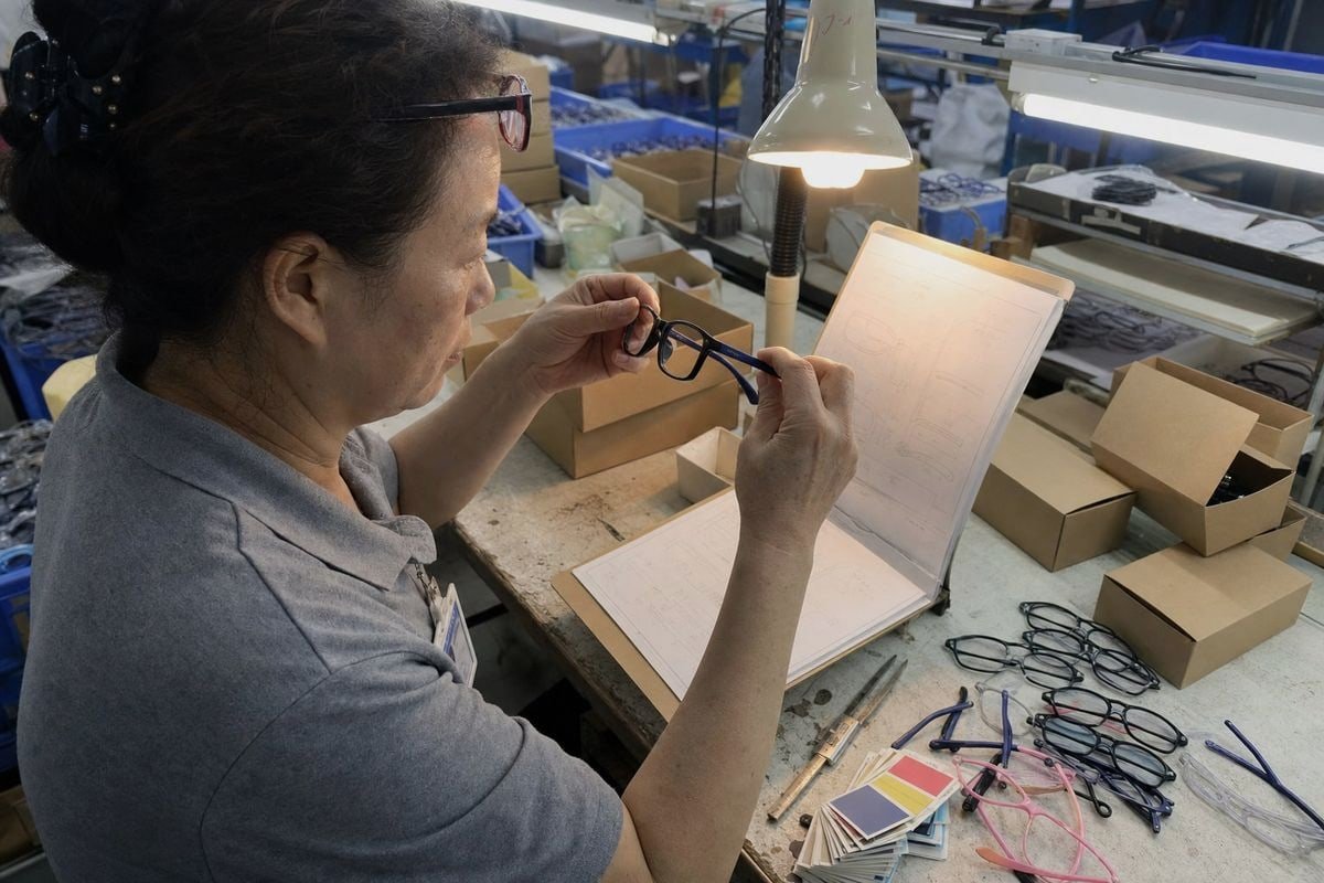 Reviewing printing and marking proof samples for kids' optical frames before production (ID#1)