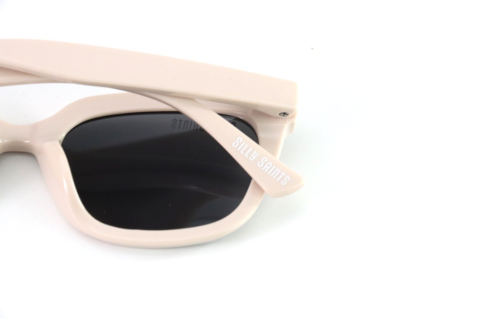 Actual sample of a pad-printed logo on an eyewear temple tip